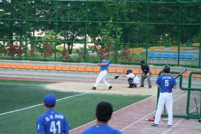 John Playing a Baseball